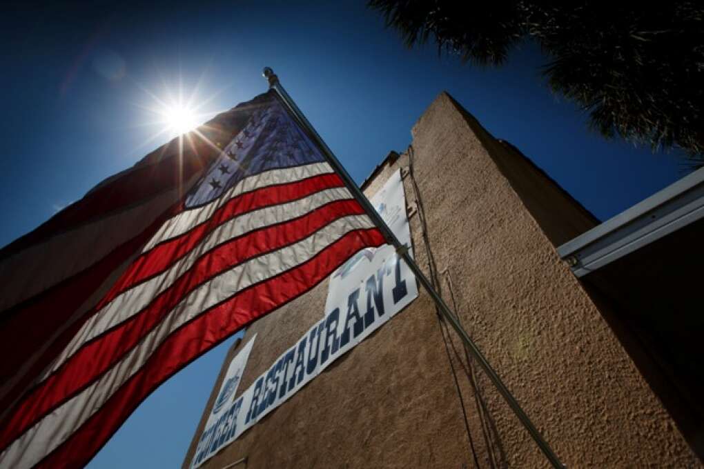 An American flag floats in the breeze outside the Pioneer Restaurant in Zolfo Springs, Florida on March 2, 2015. VISIT FLORIDA/Scott Audette