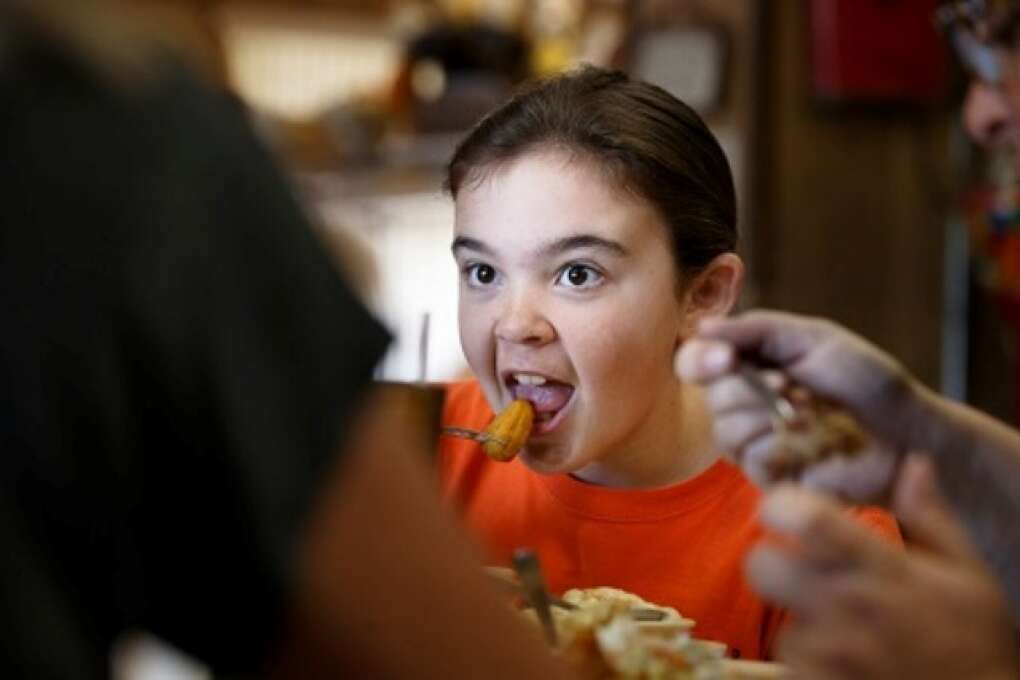 Rachel Dunleavy digs into the homestyle meals served at the Pioneer Restaurant in Zolfo Springs, Florida on March 2, 2015. VISIT FLORIDA/Scott Audette