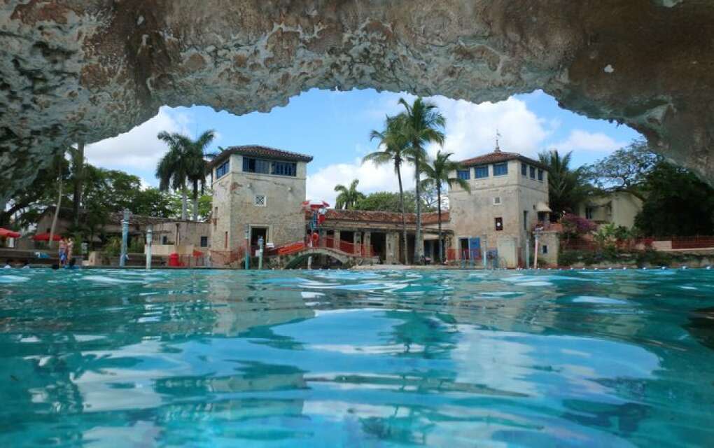 The Venetian Pool, hidden in the Miami suburb of Coral Gables, is a popular Miami family retreat with waterfalls, grottos and a manmade beach. 