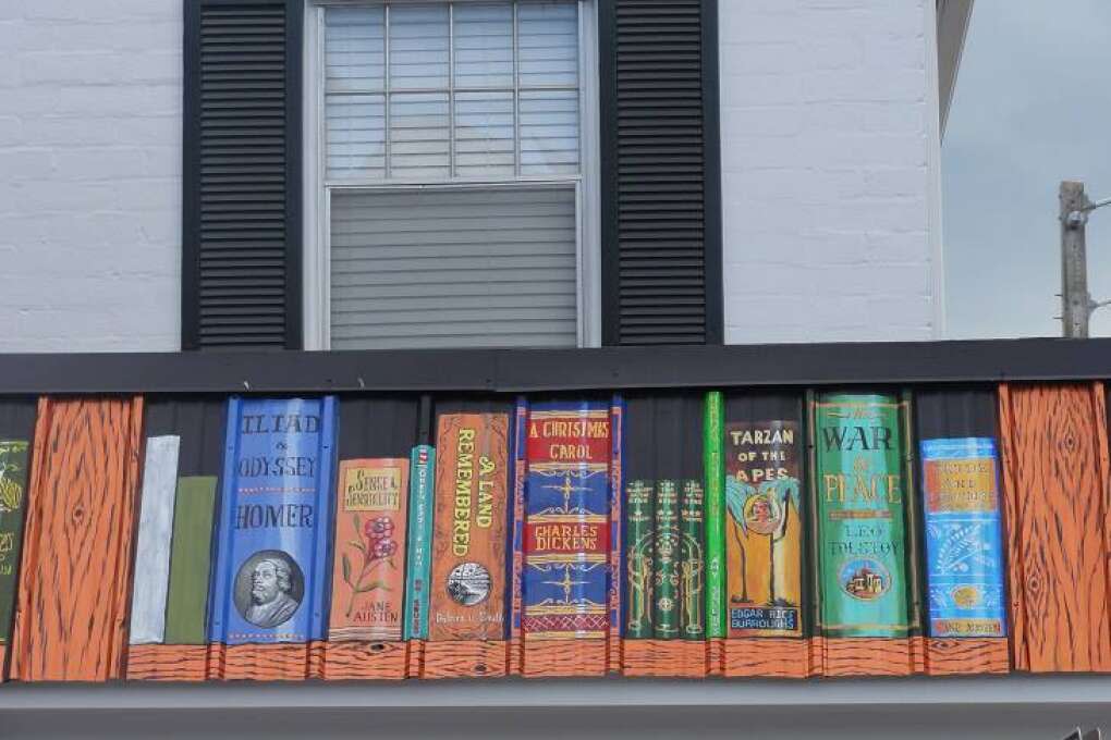 The world's biggest bookshelf? Who knows? But artist Amy Sellers created this magnifcent mural on the front of the new Barrel of Books.