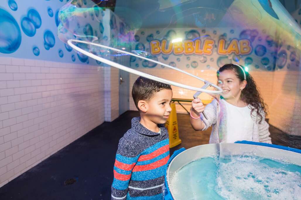 A little boy and girl play in the Bubble Lab at Wonderworks. An imaginative indoor play and exploration zone that’s part science museum and part arcade, WonderWorks includes interactive displays about natural disasters, space discovery and art, among others. For Sensory Days, WonderWorks exhibits are altered to provide limited stimulation for children with special needs.
