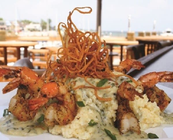 A plate with a shrimp dish called Grits a Ya Ya from the Fish House in Pensacola