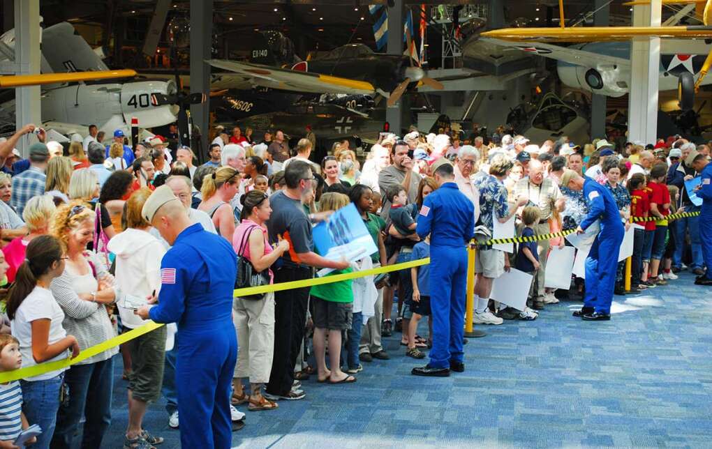 The Blue Angels, the U.S. Navy’s flight demonstration squadron, practice and sign autographs at the National Naval Aviation Museum.
