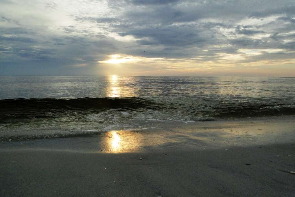 South Florida's Gulf coast promises golden sunsets over the waves, like this beauty in Boca Grande.