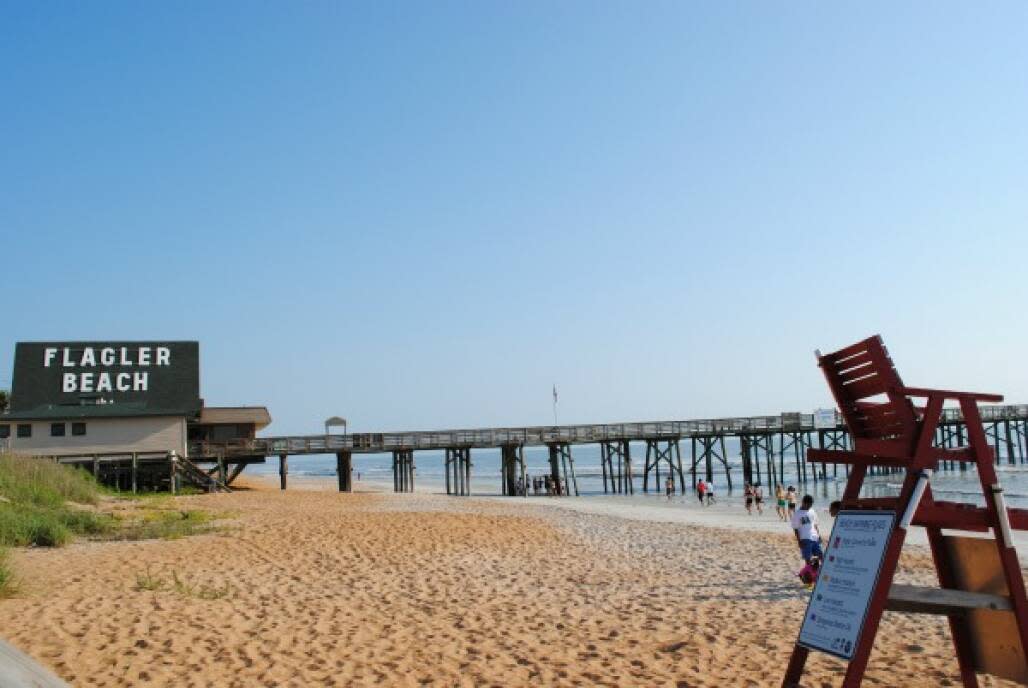 Enjoy eclectic shops, surfing, a classic fishing pier and free access to the beach at Flagler Beach.