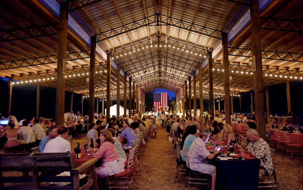 Swank Specialty Produce’s organic farm hosts “Swank Table” farm-to-table dinners by star chefs in a pole barn in Loxahatchee.