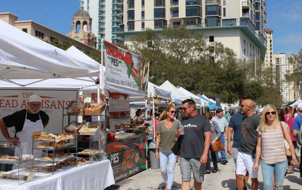  The Saturday Morning Market, downtown St. Petersburg waterfront, people walkingd prepared foods from more than 150 vendors. Kara Nicholl, University of South Florida St. Petersburg