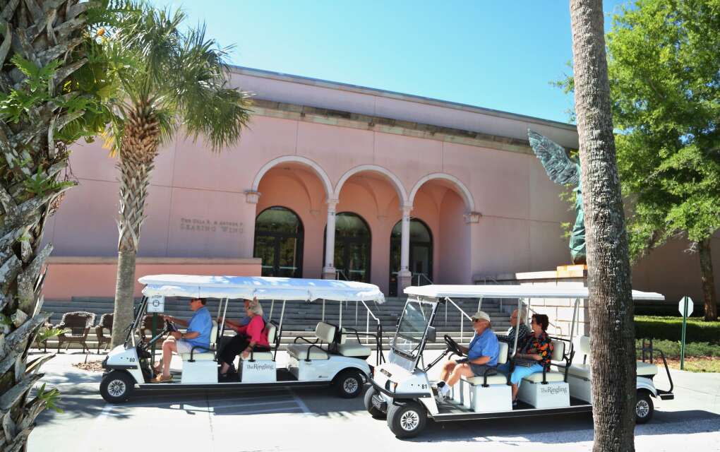 Carts carry visitors to the Ringling Art Museum. 