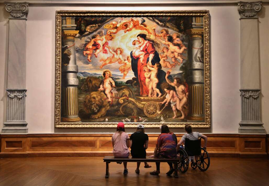 Visitors view one of Flemish painter Peter Paul Rubens works at the Ringling Museum of Art.
