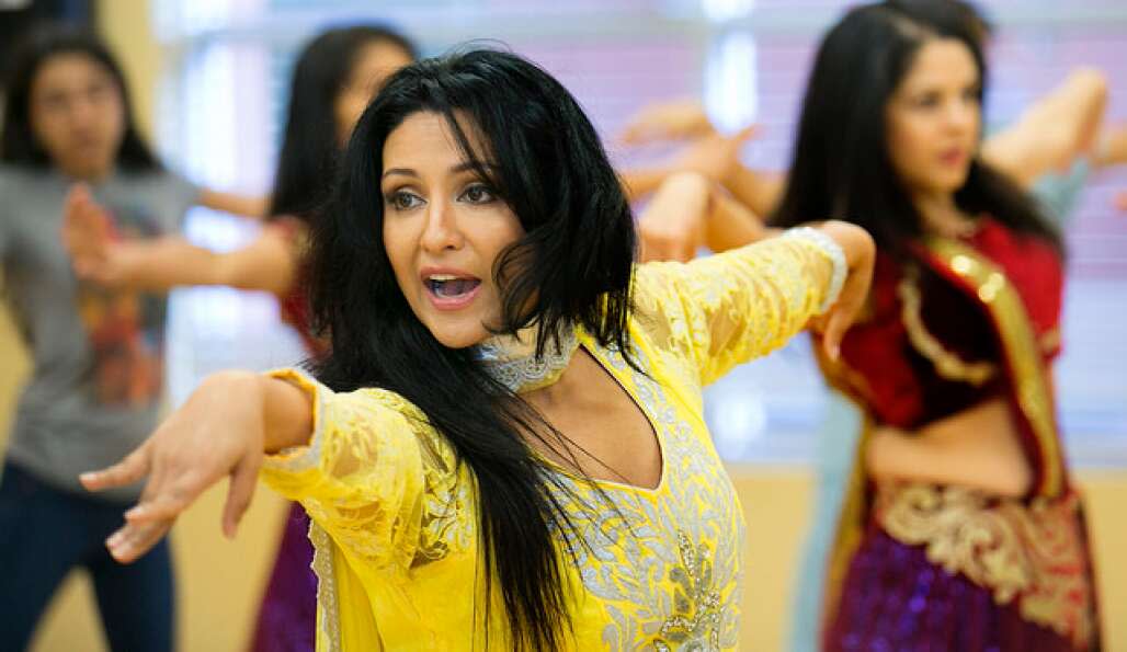 Chandni, a former Bollywood dancer whose given name is Navodita Sharma, leads a class in Indian dance in Orlando.