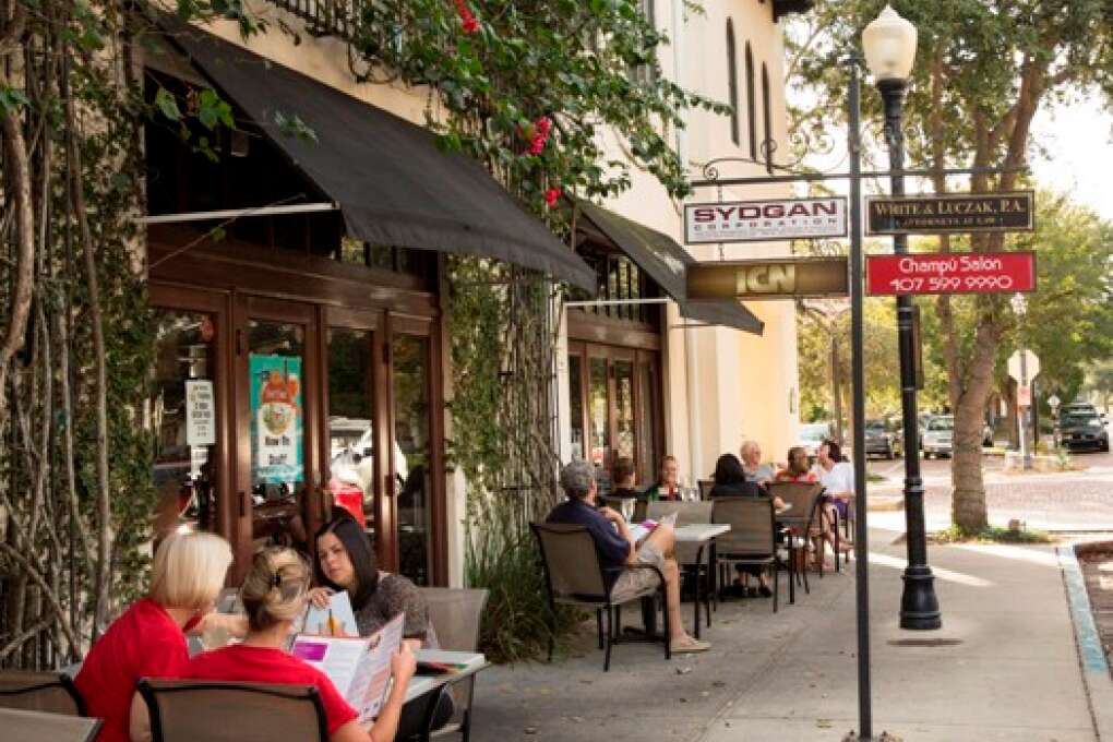 Customers at Dexter's restaurant enjoy the Hannibal Square area of Winter Park.