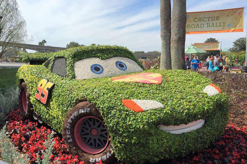 A racecar topiary at the Epcot Flower and Garden Festival