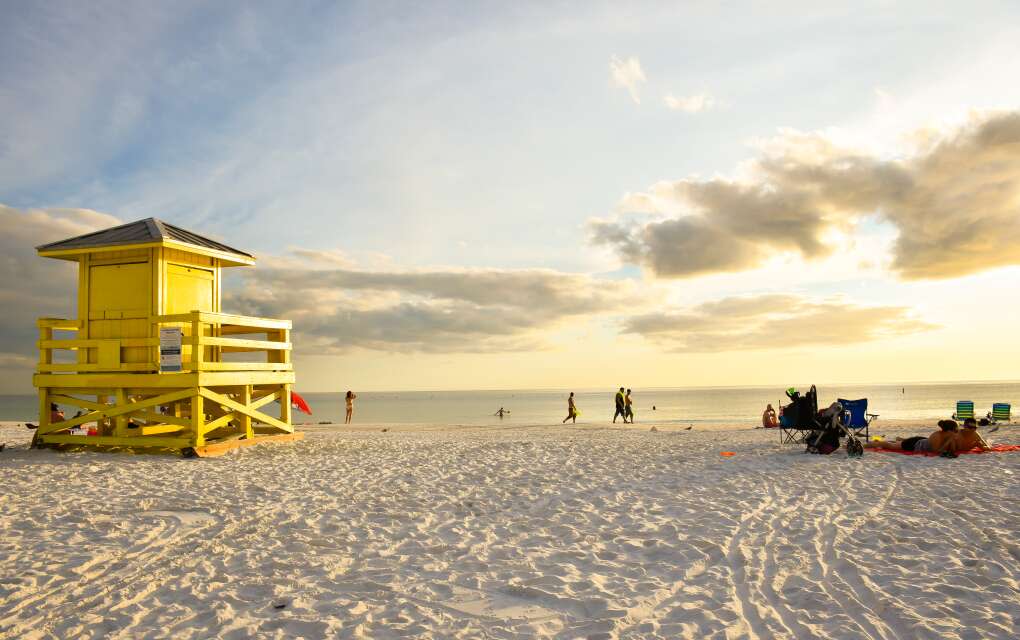 A bright yellow lifeguard hut at Siesta Key Beach near Sarasota