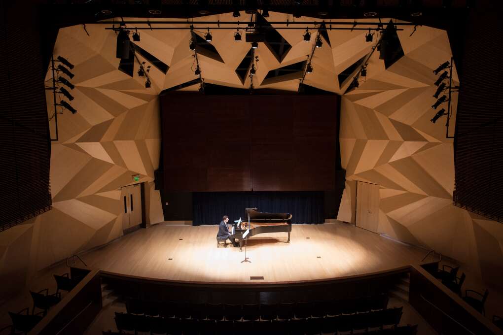 Michael Baron warms up before a performance at the U. Tobe Recital Hall at Florida Gulf Coast University in Fort Myers.