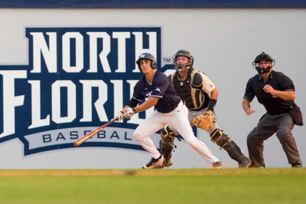 University of North Florida’s Chris Thibideau gets a hit against the University of Central Florida at Harmon Baseball Stadium, on the campus of UNF. 