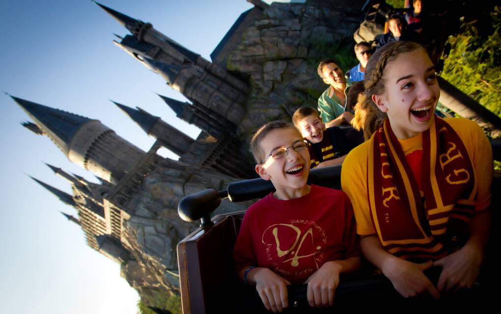 kids riding The Flight of the Hippogriff at Universal's Islands of Adventure