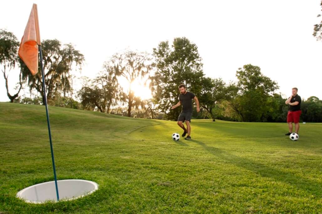 The rules of Footgolf are simple: Take a regulation soccer ball and kick it, one stroke at a time, into a large cup near the putting green on a regular golf hole.