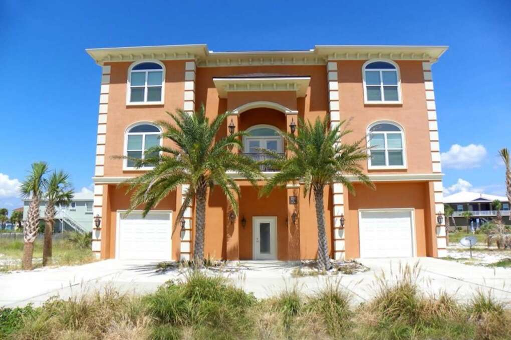 A six-bedroom home with a pool in Pensacola Beach.