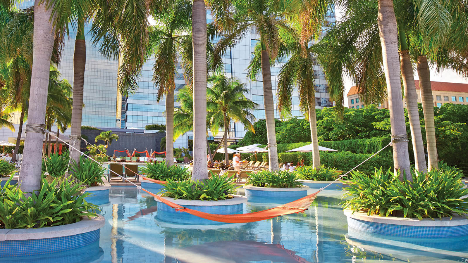 Hammocks over the water at the spa Equinox