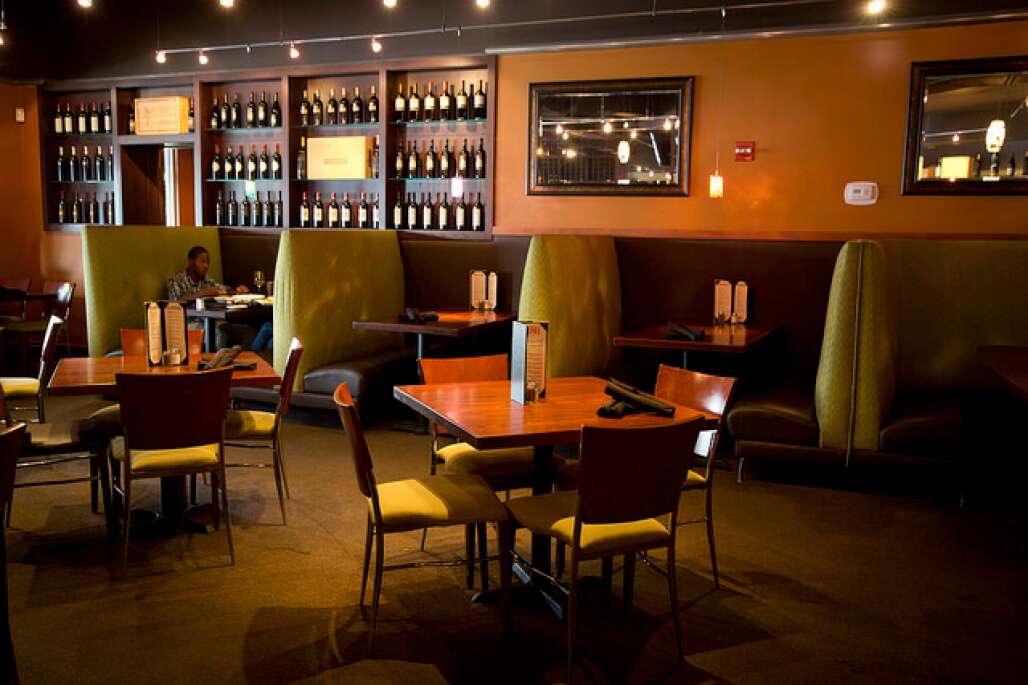 Indoor dining is cozy and sleek at Spice Modern Steakhouse, situated on Lake Eola in downtown Orlando.