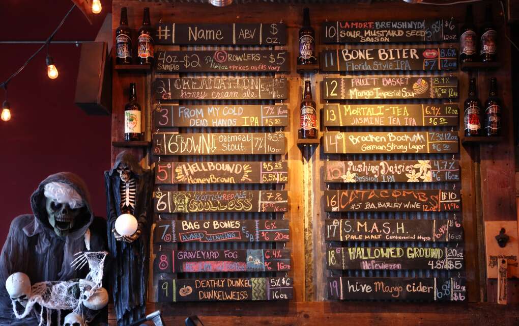  The craft beer board at Bury Me Brewing, Fort Myers takes on a ghoulish look with skeletons and ghosts. 
