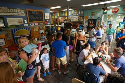 Customers in line at t-rays Burger Station