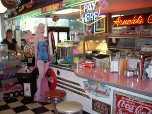Movie stars from the past greet visitors to Arnold's. 