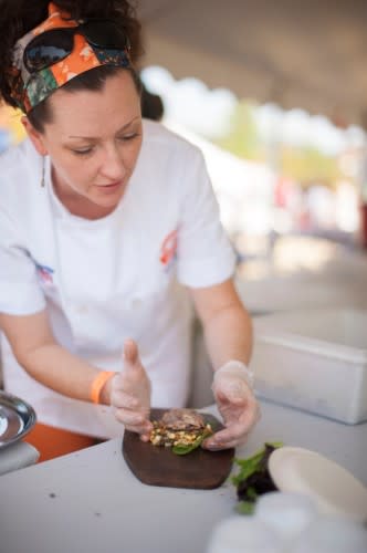 Chef prepping dish at Dig IN 2013