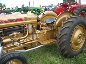 Gold 1959 Demonstrator Ford 881 tractor on display at Greensburg Power of the Past.