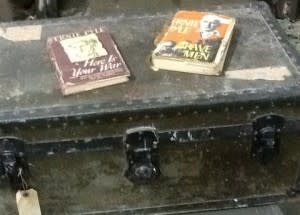 Copies of books written by Ernie Pyle, killed at Battle of Okinawa, make a poignant display. 