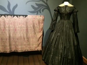 Wedding dress also served as mourning dress.