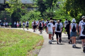 Walkers participate in group events on Cardinal Greenways trails.