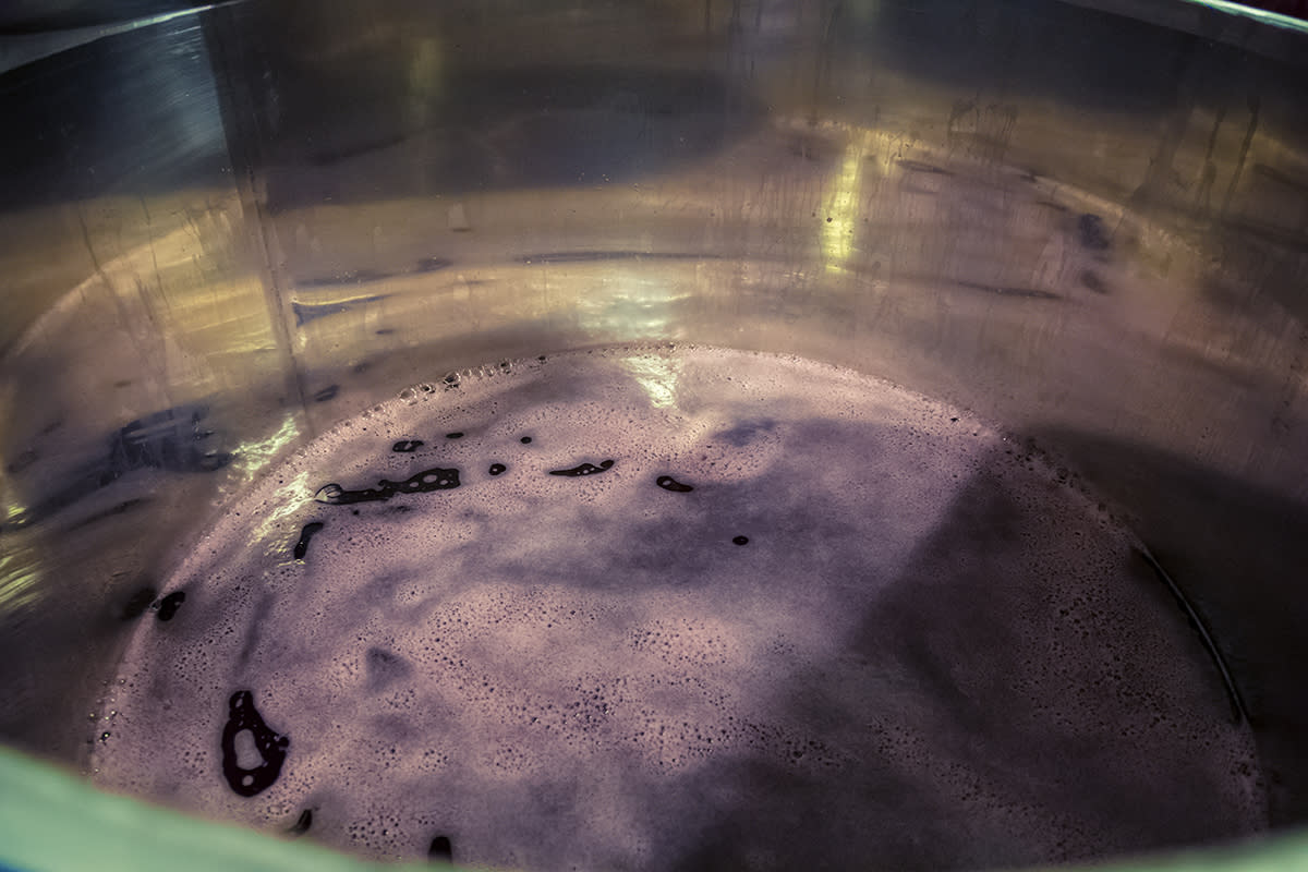Cranberry wine in the fermentation process.