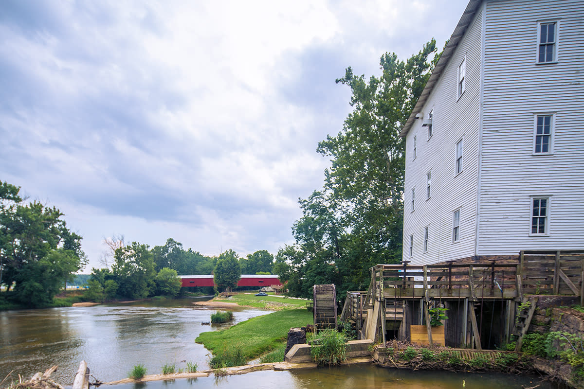 The Mansfield Roller Mill with the historic covered bridge in the background.