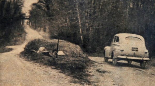 old-photo-of-grave-in-the-middle-of-the-road-amity-indiana-768x426@2x