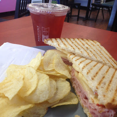 The Croque Grindhouse sandwich includes ham, Swiss, herbed dijon and sliced apples.