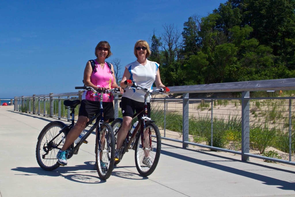 two women with bikes