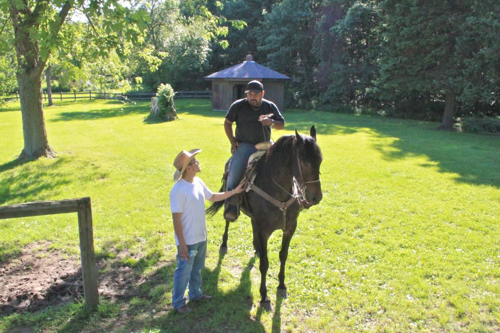 horseback riders at Glenwood Dunes Trail