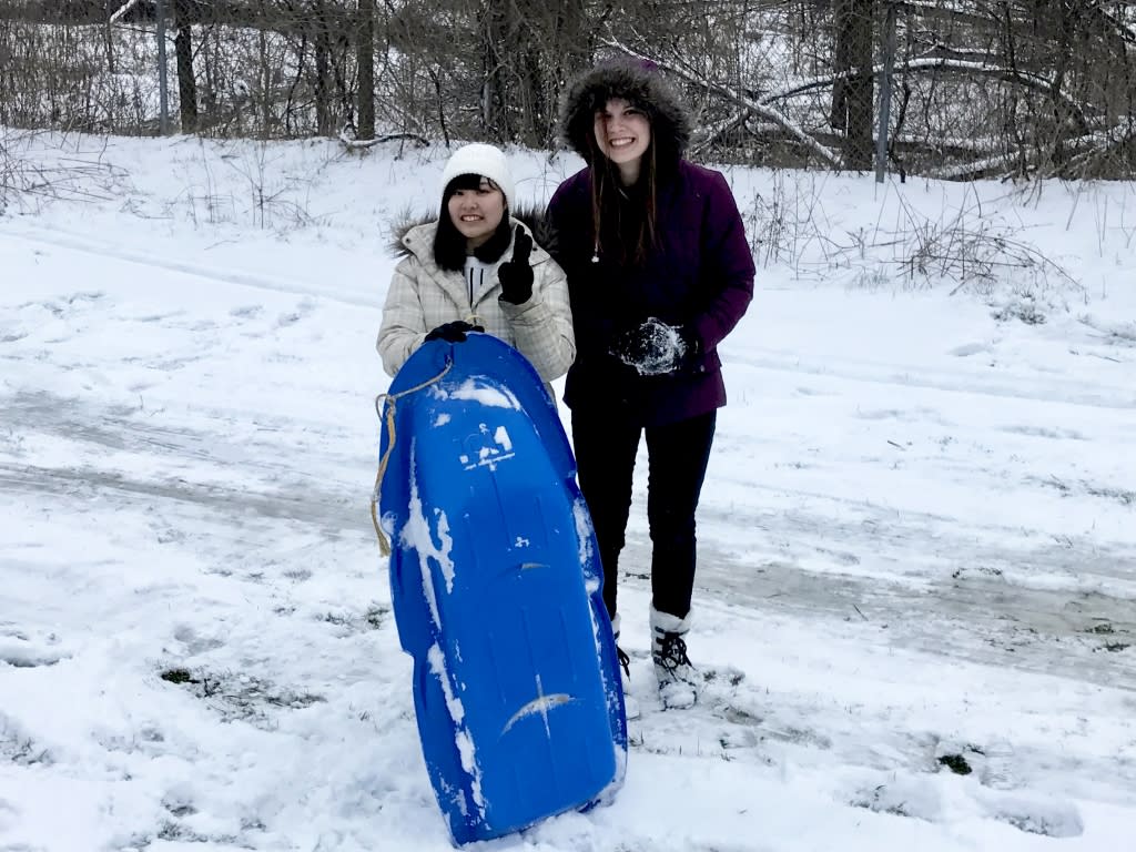 Teens with a sled