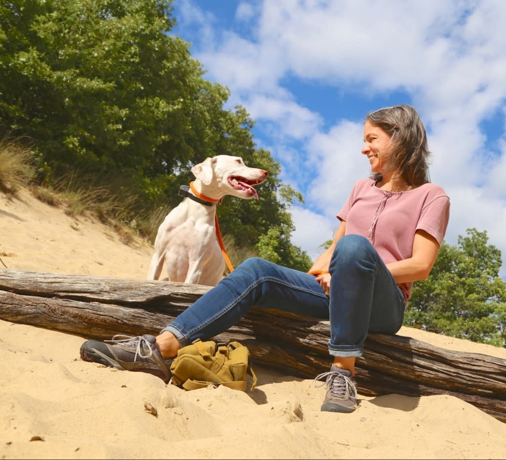 Woman with her dog on the 3 Dune Challenge
