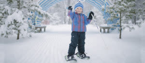 small child with snowshoes