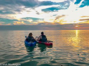 couple Kayaking at sunset