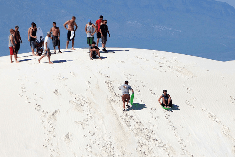 sand sledding in white sands national monument