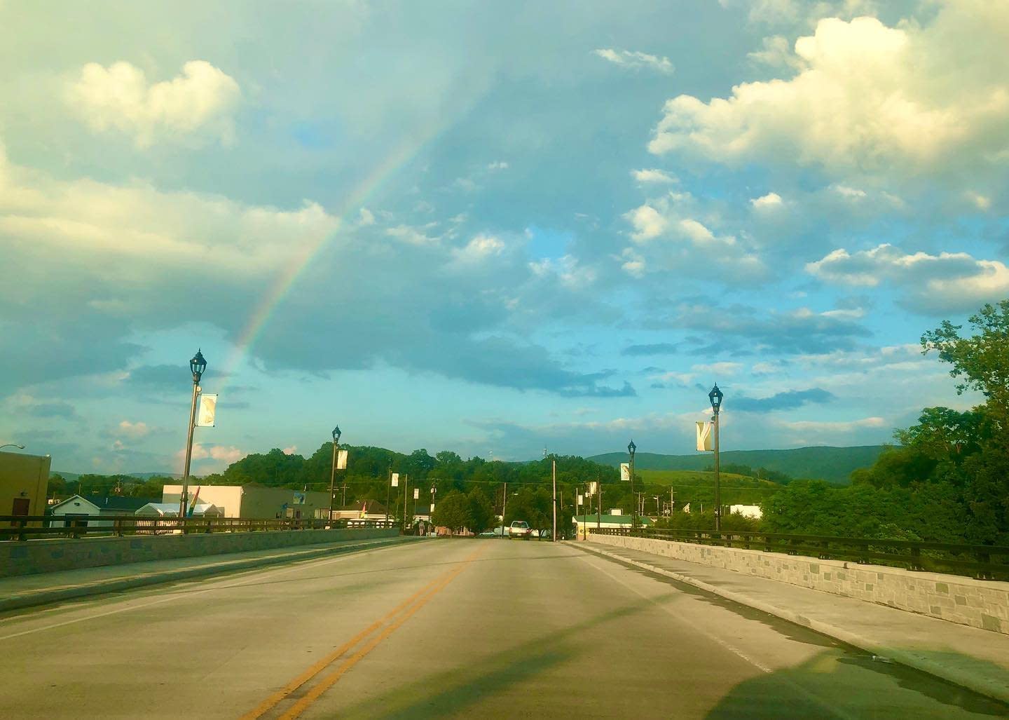 Photo by user alphaema, caption reads #rainbow #visitwaynesboro #blueridgemountains #blueridgemoments #loveva #sharewhatyoulove