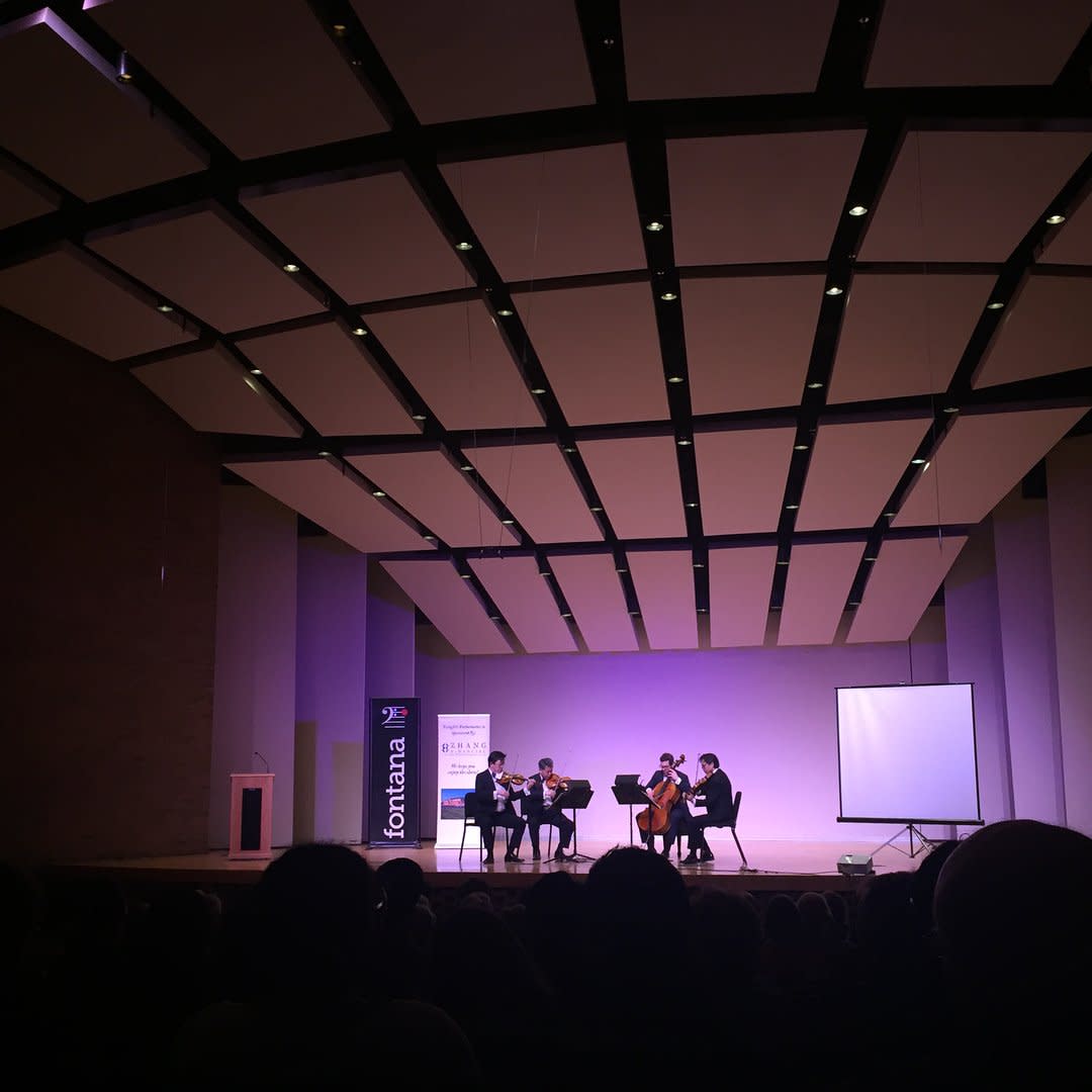 Photo by user fontanachamberarts, caption reads A beautiful performance by the Shanghai Quartet and Wu Man this weekend! Thank you to all who stayed to share our love for Betsy Wong after the concert 🎶💜💙