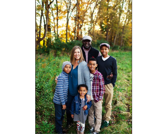 African Plum Home Owner and Family