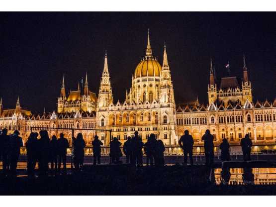 Playbill Travel shot in Budapest with silhouetted people