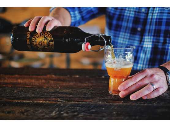 Hank Hudson Brewing bartender pouring beer
