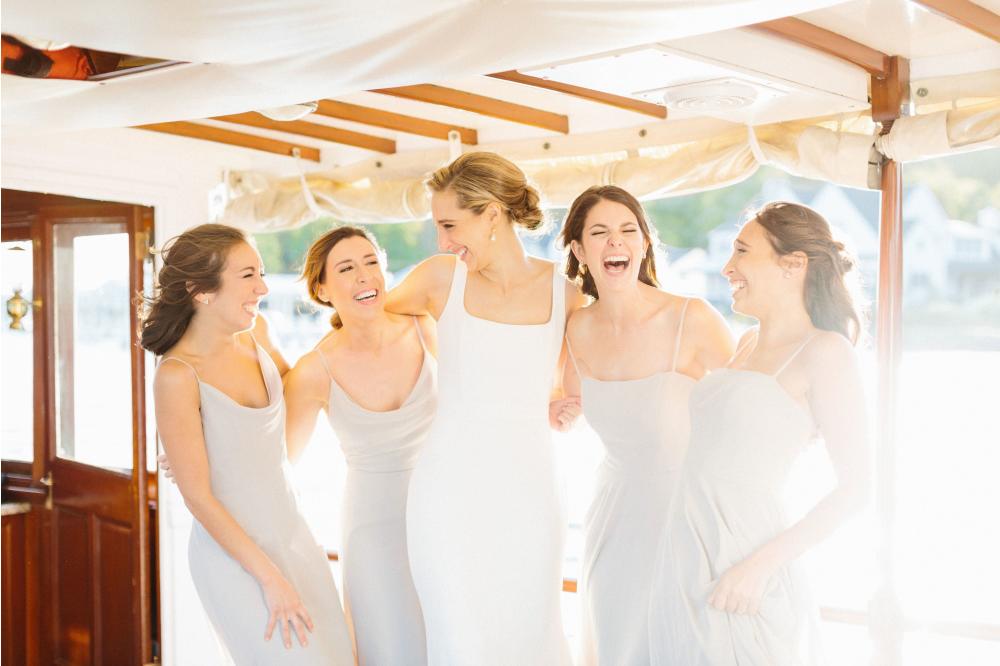 Bridal Party Laughing on board the Yacht Polaris During Cocktail Hour