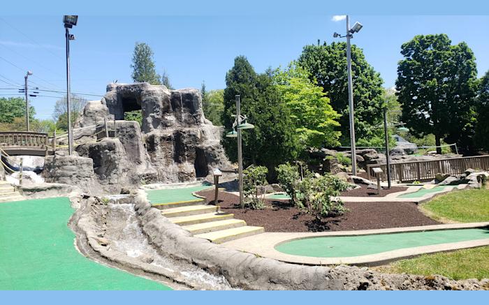 Two Miniature Golf Courses surrounded by waterfalls, streams, and trees. Fun for the whole family!